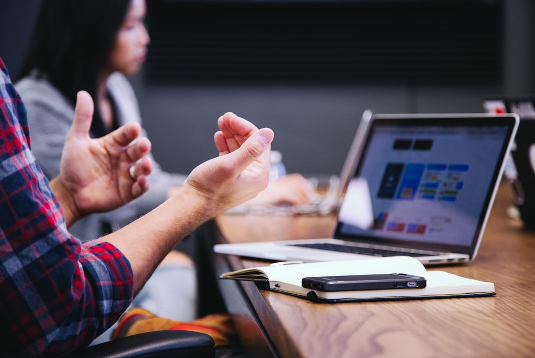 A team in an office discussing intelligent search during a meeting