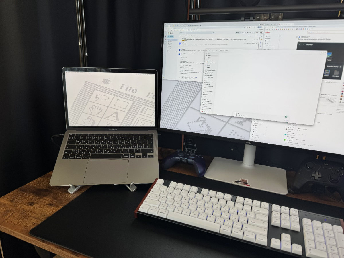 Laptop on the ORICO PN-1 stand next to an external monitor on a desk Laptop on the ORICO PN-1 stand next to an external monitor on a desk