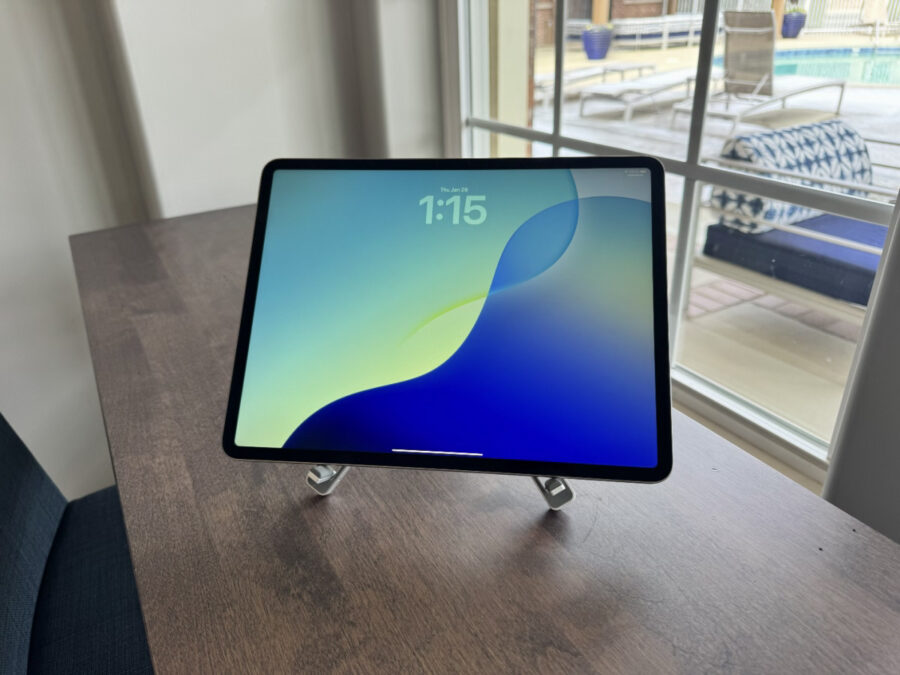 Tablet placed on the ORICO PN-1 stand on a wooden desk