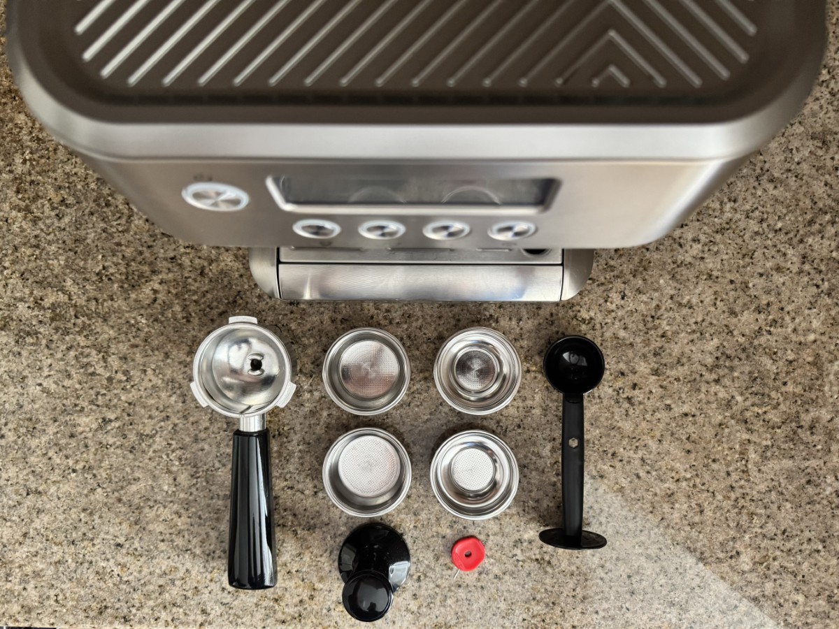 Casabrews Ultra espresso machine accessories laid out on a countertop Casabrews Ultra espresso machine accessories laid out on a countertop