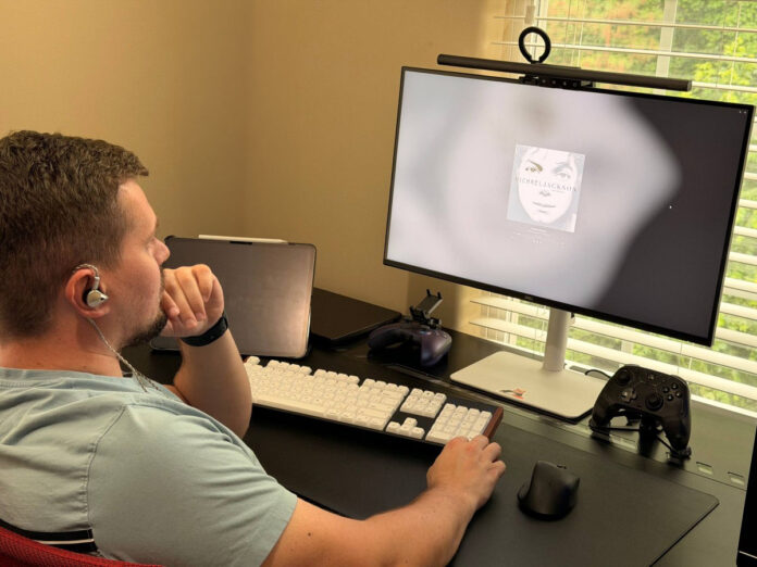 User listening to music with ATK Horizon earphones during a desktop audio test. User listening to music with ATK Horizon earphones during a desktop audio test.