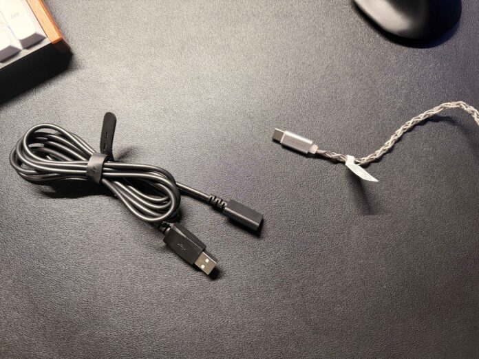 ATK Horizon USB-C DSP cable and included USB extension cable on a desk. ATK Horizon USB-C DSP cable and included USB extension cable on a desk.