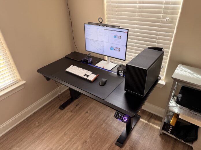 Fully assembled DXRacer Tidal XL desk with monitor, desktop PC, laptop, and peripherals installed DXRacer Tidal XL Gaming Desk