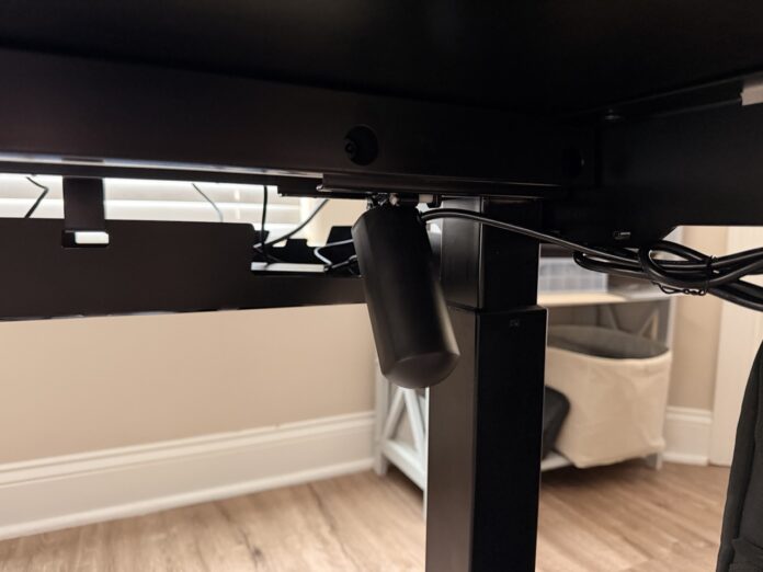 A motor powering lifting mechanism on DXRacer Tidal XL DXRacer Tidal XL Gaming Desk