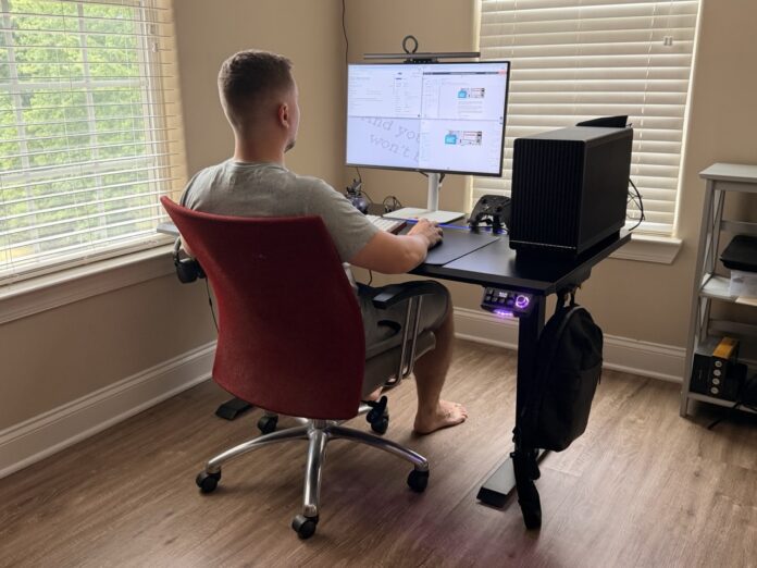 DXRacer Tidal XL in seated mode with monitor, desktop PC, and accessories installed DXRacer Tidal XL Gaming Desk