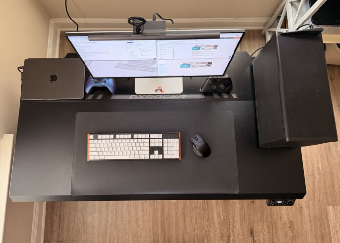 Top-down view of the DXRacer Tidal XL desk with a complete gaming and productivity setup. DXRacer Tidal XL Gaming Desk