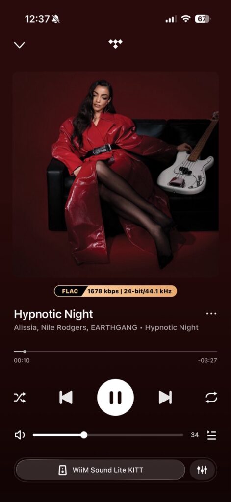 TIDAL Connect streaming music to WiiM Sound Lite with playback controls and audio quality information. TIDAL Connect streaming music to WiiM Sound Lite with playback controls and audio quality information.