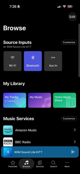 WiiM Home app Browse tab displaying available audio inputs including Wi-Fi, Bluetooth, Aux In, local music library, and integrated music services.