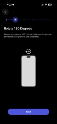 WiiM Home app RoomFit setup showing how to rotate the phone 180 degrees before calibration.