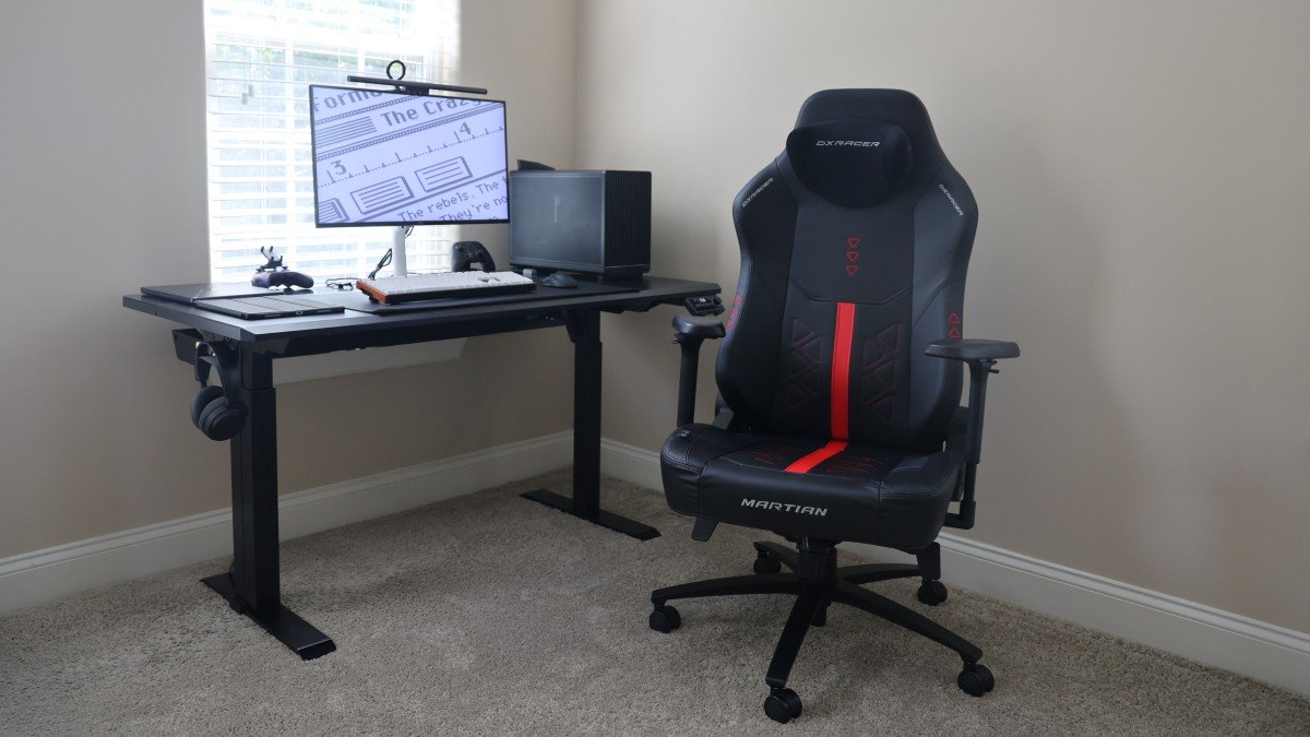 DXRacer Martian Pro XL gaming chair next to a standing desk in a home office setup