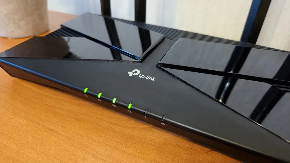 TP-Link садақшы AX23